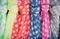 Many colorful dotted cotton summer scarves