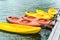 Many colorful kayaks floating in sea in Vietnam