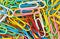 Many colorful paper clips