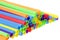 Many colorful plastic straws with opening forward isolated