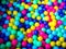 Many colour plastic balls, children`s party, a games room, a box filled with small colored balls