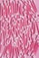 Many cotton swabs on a pink background