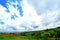 Many country houses on the high mountains hill with beautiful blue sky