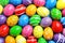 Many decorated Easter eggs as background, top view