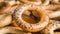 Many delicious ring shaped Sushki dry bagels as background, closeup