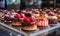 Many different cakes on shelf in cafe, closeup. Delicious dessert