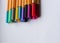 Many different colored pens. Color pencils isolated on a white background
