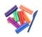 Many different colorful plasticine pieces and sculpting knife on white background, top view