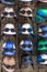 Many different colorful vintage motorbike helmets