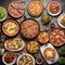 many different dishes standing next to each other shot from above. include pizza, lasagne, steak, burger - 1