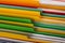 Many different files with documents as background, closeup