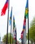 Many different flags street Europe members Union building countries nation road way grass flowers green color type The Hague