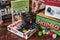 Many different packs of board games and dices as activity against boredom