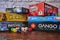 Many different packs of board games and dices as activity against boredom