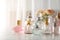 Many different perfume bottles on dressing table