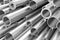 Many different steel pipes, industrial background