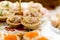 Many different tartlets with pate on a festive table