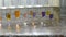 Many different test tubes with color liquid water in the laboratory with reagents on old window with a marble window