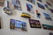 Many Different Travel Magnet Souvenirs on White Fridge, Door