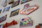 Many Different Travel Magnet Souvenirs on White Fridge, Door