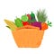 Many different vegetables and fruits in brown wicker basket