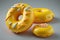 Many donut with sweet, yellow topping that\'s hard to resist