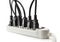 Many electrical cords connected to a power strip