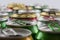 Many empty cans. Recycling, a lot of recycled cans made from aluminum. are being prepared for re-production. A lot of opened soda,