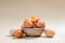 Many farm organic eggs in a bowl on a pastel background.