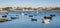 Many fisherman boats docked at river with Porto Oporto city background