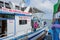 Many fishing vessel parked in the harbor