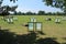 Many folding chairs in Hyde Park in the city London.