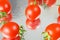 Many fresh tasty tomatos cherry background, plum tomatoes, closeup, rotation