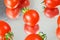 Many fresh tasty tomatos cherry background, plum tomatoes, closeup, rotation