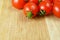 Many fresh tasty tomatos cherry background, plum tomatoes, closeup, rotation