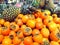 Many fruits persimmon and pineapples lying in supermarket