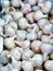 Many Garlic Bulbs For Sale at Fruit and Vegetable Market