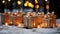 Many gift boxes on a snowy surface with blurred lights