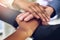 Many hands and one vision make a successful team. Closeup shot of a group of colleagues joining their hands together in