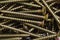 Many heap of metal screws backgrounds