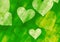 Many hearts on green backgrounds of Love symbol