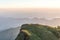 Many hikers is enjoying on the mountain ridge at sunset