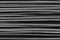 Many horizontally placed metal springs background surface