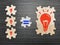 Many ideas result big idea. Light bulbs icon on jigsaw puzzle pieces.