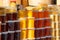 Many jars with honey