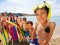 Many kids on beach with boy in snorkeling mask