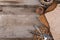 Many kitchen items fork knives on wooden photo Top view