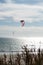 Many kite surfers with their kite parachutes in the air on the beach of Tarifa