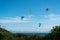 Many kite surfers with their kite parachutes in the air on the beach of Tarifa