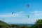 Many kite surfers with their kite parachutes in the air on the beach of Tarifa